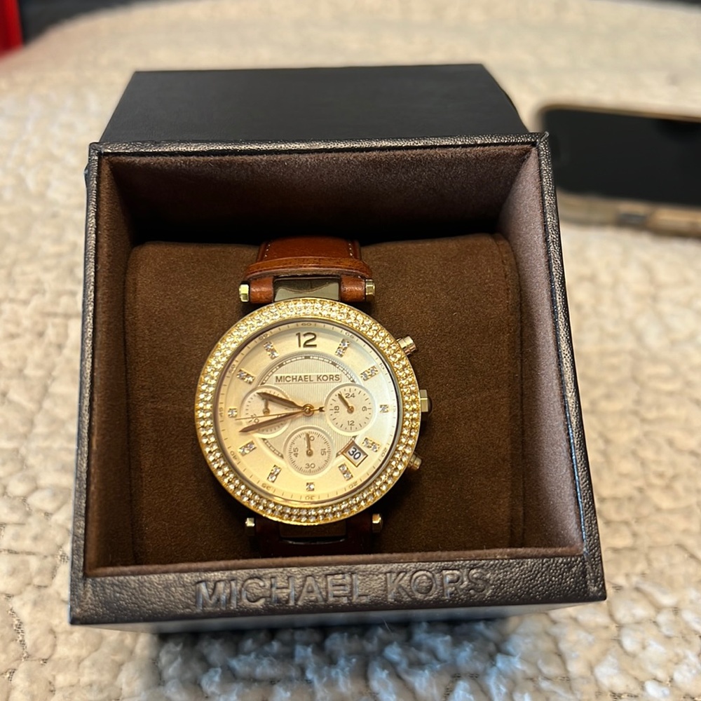 Michael Kors watch with a leather brown band